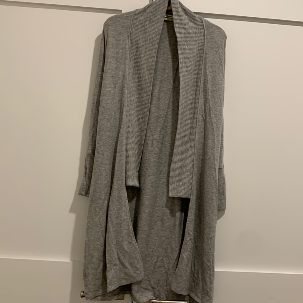 Woman’s long sweater